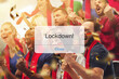 © master1305 - Cancellation. Soccer, football fans with snacks cheering for favourite sport team on stadium, behind the message with word Lockdown. Look excited, shocked, highly tensioned. Blocked social life.