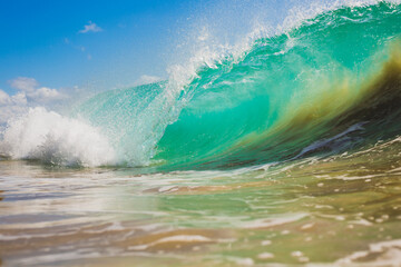 turquoise blue wave breaking