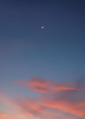 Poster - The crescent moon on colorful cloud in the blue sky at evening