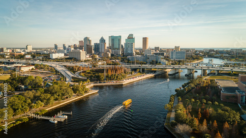 Fototapeta Tampa, FL USA - 1-20-2021: Grandious aerial view over the Hillsborough river leading to downtown Tampa.