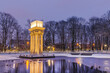 © marcin jucha - Historical Monument Illuminated at Twilight in Park Strzelecki,Tarnow,Poland. Winter in the City