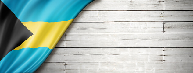 Wall Mural - Bahamian flag on old white wall banner