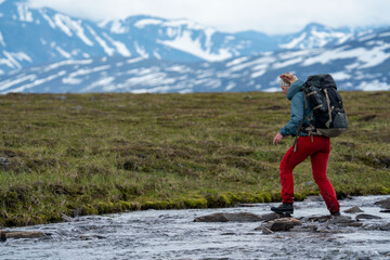 team work during long hike in padjelanta national park, europe
