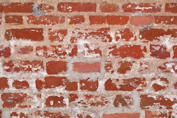 Background of a brick wall. Natural old masonry bricks