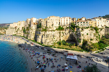 Wall Mural - View of Tropea, a popular seaside resort town in Calabria region with old buildings built on the cliffs overlooking the sea, Italy