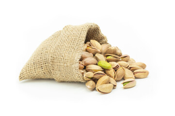 Wall Mural - Peeled roasted pistachios in burlap sack isolated on white background, healthy nut