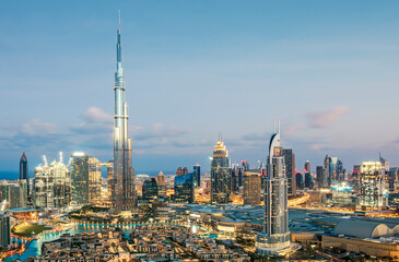 Wall Mural - View on modern skyscrapers and busy evening highways in luxury Dubai city,Dubai,United Arab Emirates