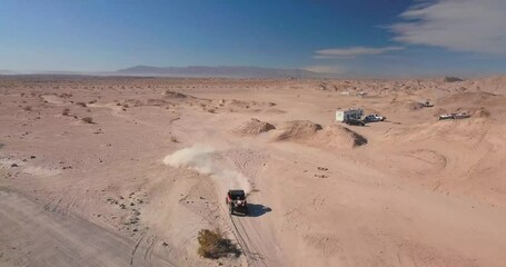 Wall Mural - Off-road Vehicle driving in the desert