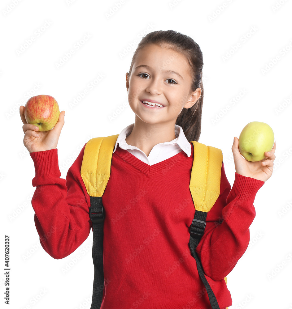 Schoolgirl with apples on white background