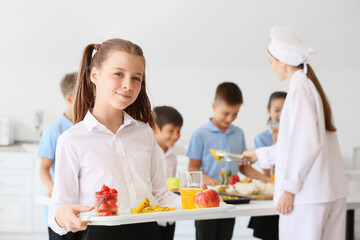 Sticker - Schoolgirl having lunch in school canteen