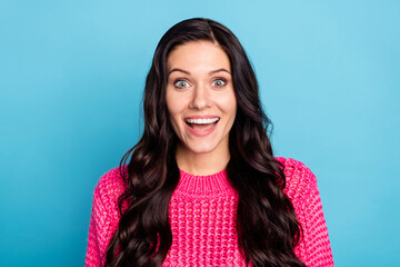 Poster - Portrait of attractive amazed cheerful wavy-haired girl laughing having fun isolated over bright blue color background