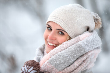 Wall Mural - Beautiful woman in wintertime among snow