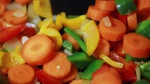 Fresh Colorful Vegetables Sizzling In A Pan