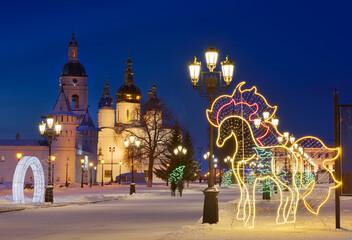 Tobolsk Kremlin on Christmas night. Ancient Russian architecture of the XVII century in the first capital of Siberia in winter, festive lights in the night