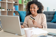 Black Woman Paying Online Purchase With A Debit Card