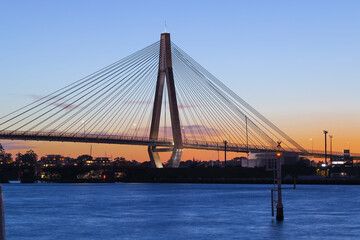 Anzac Bridge at Sunset orange and blue skies Sydney NSW Australia