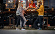 © luckybusiness - friends toasting and eating in front of modified truck for mobile fast food service