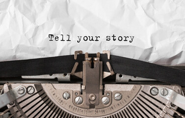 Wall Mural - Text Tell Your Story typed on retro typewriter