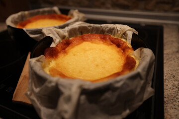 freshly baked cheesecake baked without unmoulding on the kitchen worktop