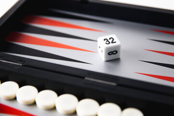 backgammon board and pieces on a white background