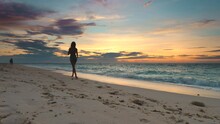 Asia Sunset Silhouette Woman: Beach Sport, Girl Run At Ocean Dark Coastline On Sand Shore Of Boracay Island, Philippines. Picturesque Sun Set Recreation On Tropic Resort In Golden Tones. Shot 4K, UHD