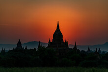 SUNSET, TEMPLES OF BAGAN, MYANMAR - 30 January 2018: Silhouette Of Iconic Bagan Temple Shape At Sunset.