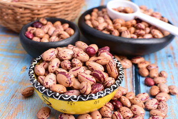 
Natural bean grains
Phaseolus vulgaris on blue grain wood background