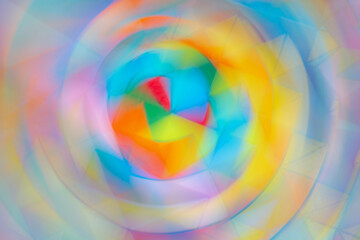 Colorful motion abstract photography. Defocused gradient colors flow to create a circular pattern with lines and angles. Vibey pastel swirl for social media, art, greeting card, poster, backgrounds.