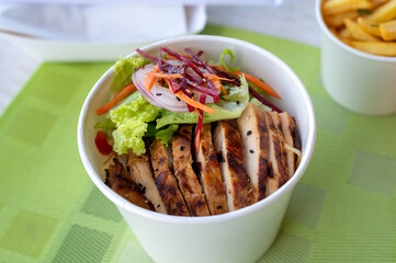 Wall Mural - Grilled chicken with vegetables noodle meal in a box