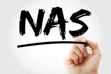 Aufkleber - NAS - Network Attached Storage acronym with marker, technology concept background