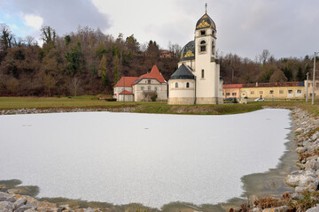 Wall Mural - Greek Catholic Church on the frozen lake in Pribic, Croatia