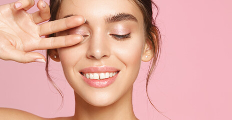 Wall Mural - Skincare and beauty. Close up of young woman face and white smile, showing glowing healthy skin after nourishment and facial treatment