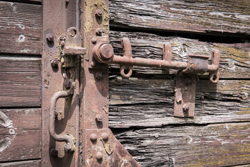 Sticker - Closeup shot of an old rusty door of abandoned train