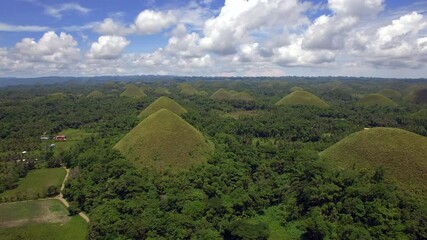 Wall Mural - Bohol Island, Philippines, aerial view of natural landmark Chocolate Hills on a beautiful Spring day. 