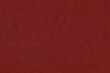 Red maroon background textured artificial leather surface