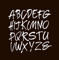 Wall Mural - vector acrylic brush style hand drawn alphabet font. calligraphy alphabet on a black background