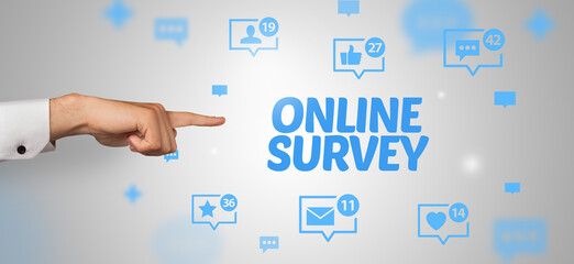 close-up of cropped hand pointing at online survey inscription, social networking concept