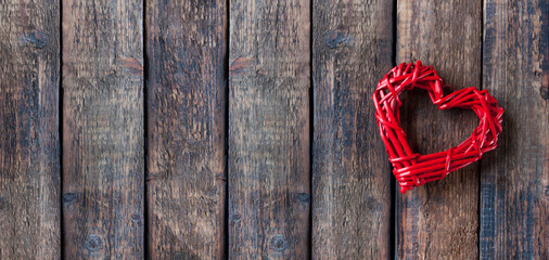 Wall Mural - Red heart on a wooden background. Valentine's Day. Love