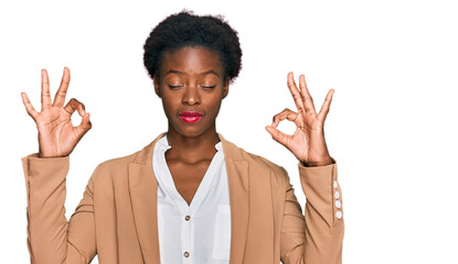 Canvas Print - Young african american girl wearing business clothes relax and smiling with eyes closed doing meditation gesture with fingers. yoga concept.