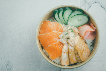 Salmon don, salmon with rice in bowl japanese cuisine. Concept take home or delivery food