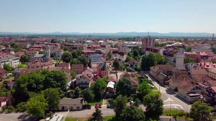 Poster - An aerial view of the buildings, roads, and water at the Brcko district, Bosnia and Herzegovina in HD