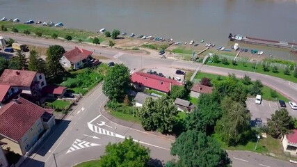 Poster - An aerial view of the buildings, roads, and water at the Brcko district, Bosnia and Herzegovina in HD