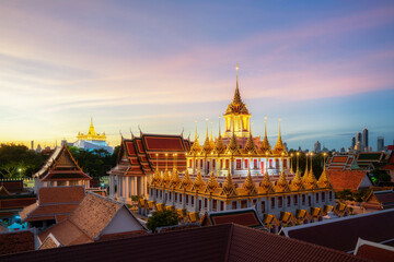 Canvas Print - Golden metal castle illuminated, Wat Ratchanatdaram Woravihara