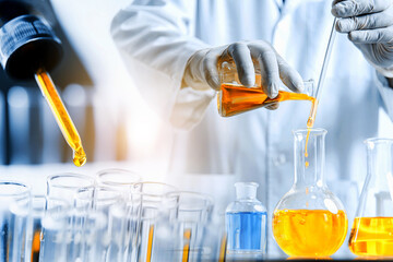 Wall Mural - hand of scientist holding flask with lab glassware and test tubes in chemical laboratory background,