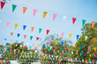 canvas print picture - Colorful bunting decoration in outdoor summer festival party. Vintage festival and celebration concept.