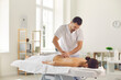 © Studio Romantic - Massage session in medical clinic from professional doctor masseur