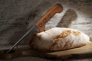 Bread at leaven. Fresh homemade  bread on wooden background