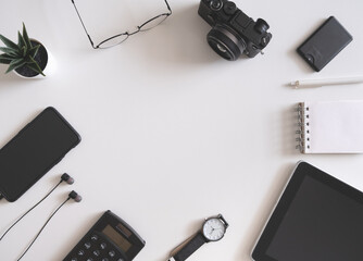 Poster - top view of office desk table with tablet and smartphone on white background, graphic designer, Creative Designer concept.