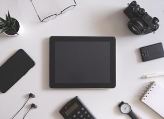 Poster - top view of office desk table with tablet and smartphone on white background, graphic designer, Creative Designer concept.