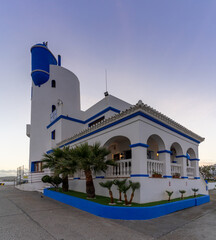 Wall Mural - typical white Andalusian buildings in La Duquesa at sunset